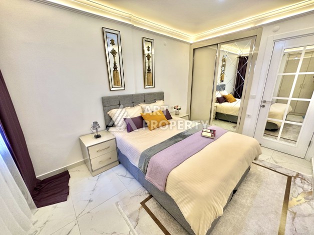 Квартира 1+1 на первой линии в Махмутларе, 50 кв.м. - Ракурс 6