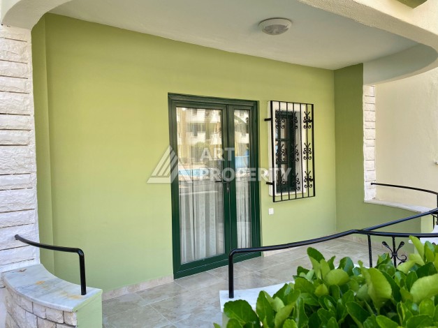 Квартира 1+1 на первой линии в Махмутларе, 50 кв.м. - Ракурс 8