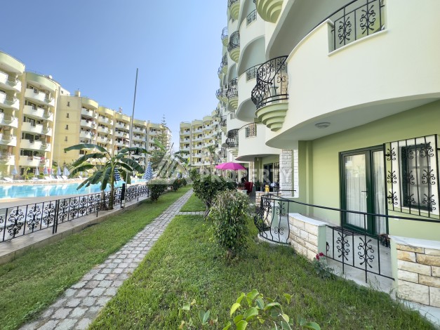 Квартира 1+1 на первой линии в Махмутларе, 50 кв.м. - Ракурс 9