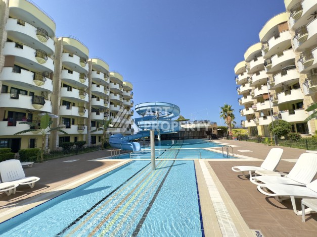 Квартира 1+1 на первой линии в Махмутларе, 50 кв.м. - Ракурс 13