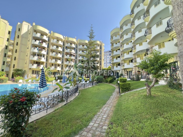 Квартира 1+1 на первой линии в Махмутларе, 50 кв.м. - Ракурс 15