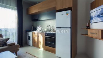 Уютная квартира 1+1 в Махмутларе, 60 м². Выгодное предложение - Ракурс 2