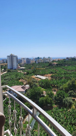 Меблированная квартира 2+1 с частичным видом на море в районе Махмутлар, 115 м2 - Ракурс 3