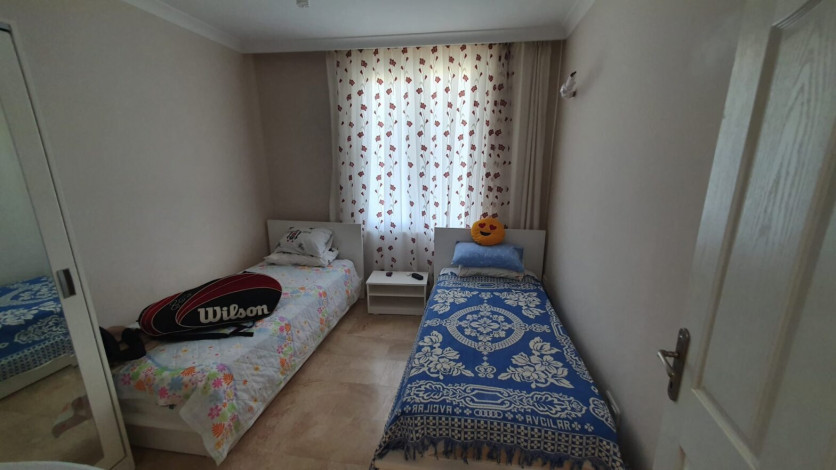 Меблированная квартира 2+1 с частичным видом на море в районе Махмутлар, 115 м2 - Ракурс 5