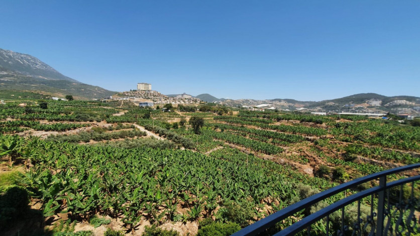 Меблированная квартира 2+1 с частичным видом на море в районе Махмутлар, 115 м2 - Ракурс 7