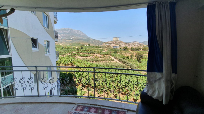 Меблированная квартира 2+1 с частичным видом на море в районе Махмутлар, 115 м2 - Ракурс 8