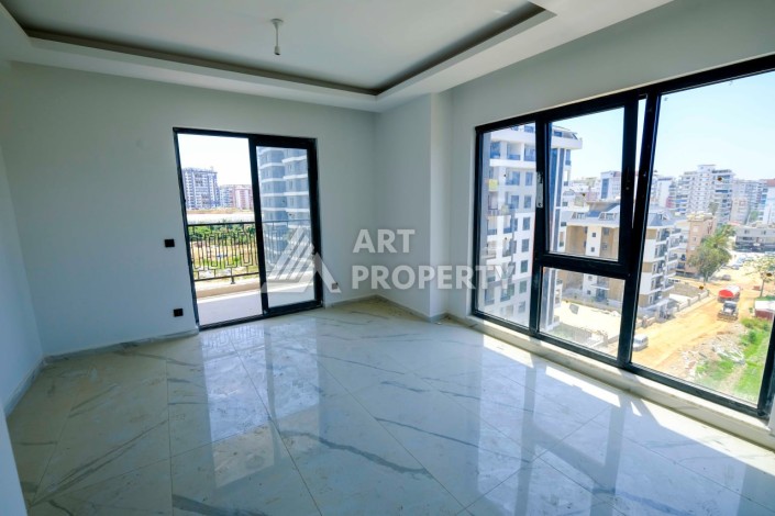 Квартира 1+1 в новой резиденции в центре Махмутлара, 55 кв.м. - Ракурс 4