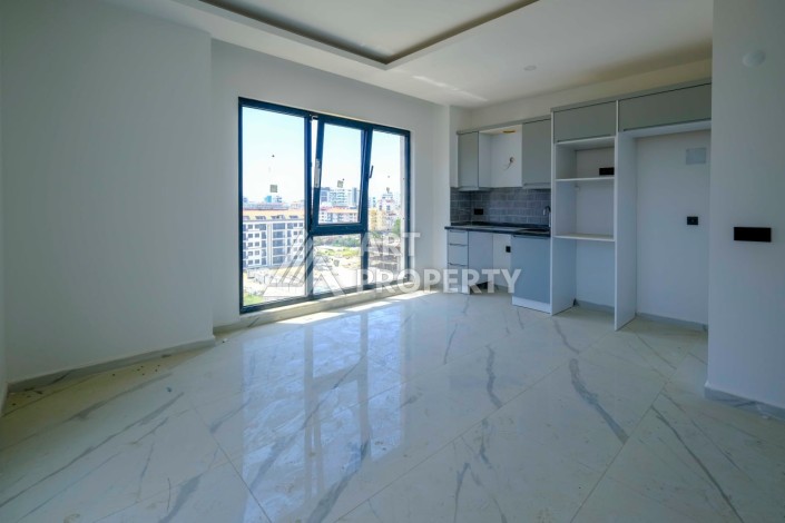 Квартира 1+1 в новой резиденции в центре Махмутлара, 55 кв.м. - Ракурс 6