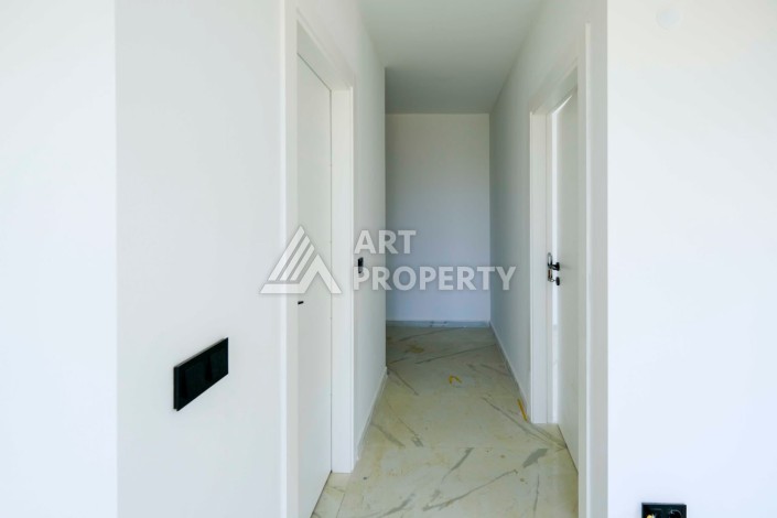 Квартира 1+1 в новой резиденции в центре Махмутлара, 55 кв.м. - Ракурс 9