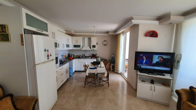 Меблированная квартира 2+1 с частичным видом на море в районе Махмутлар, 115 м2 - Ракурс 15