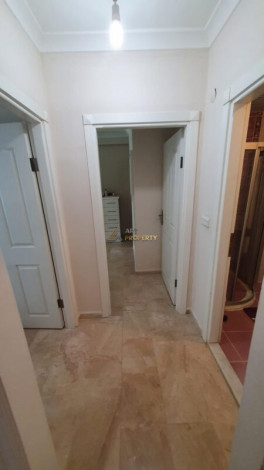 Меблированная квартира 2+1 с частичным видом на море в районе Махмутлар, 115 м2 - Ракурс 16