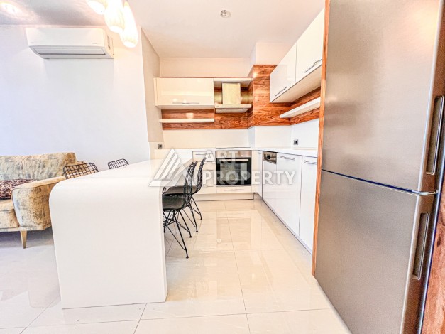 Квартира 2+1 с видом на море в Махмутларе, 110 кв.м. - Ракурс 5