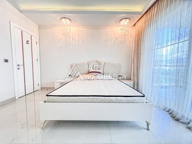 Квартира 2+1 с видом на море в Махмутларе, 110 кв.м. - Ракурс 13