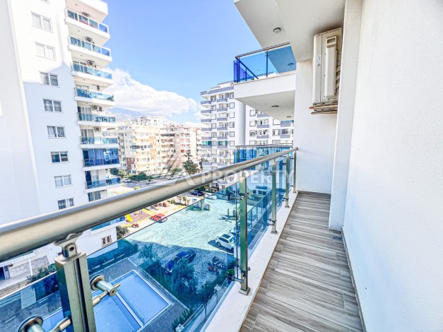 Квартира 2+1 с видом на море в Махмутларе, 110 кв.м. - Ракурс 20