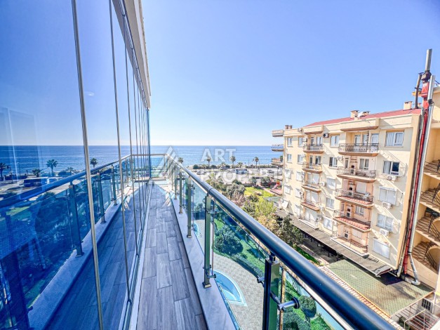 Квартира 2+1 с видом на море в Махмутларе, 110 кв.м. - Ракурс 21