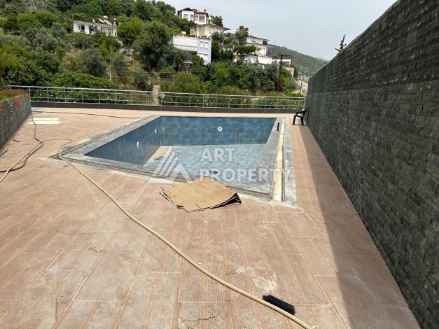 Квартира 1+1 в районе Буюкхасбахче, 55 кв.м. - Ракурс 18