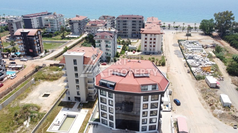 Меблированная квартира 1+1 в 100 метрах от моря в Кестеле - Ракурс 2