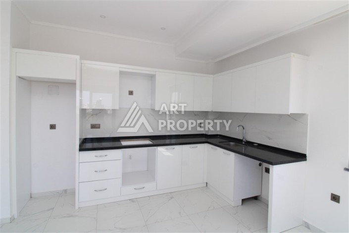 Квартира 2+1 в новом доме, 90 кв.м. Центр Махмутлара - Ракурс 4