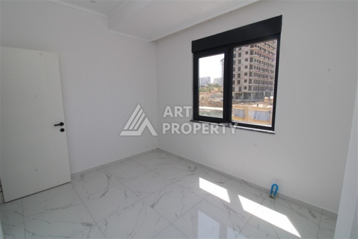 Квартира 2+1 в новом доме, 90 кв.м. Центр Махмутлара - Ракурс 7