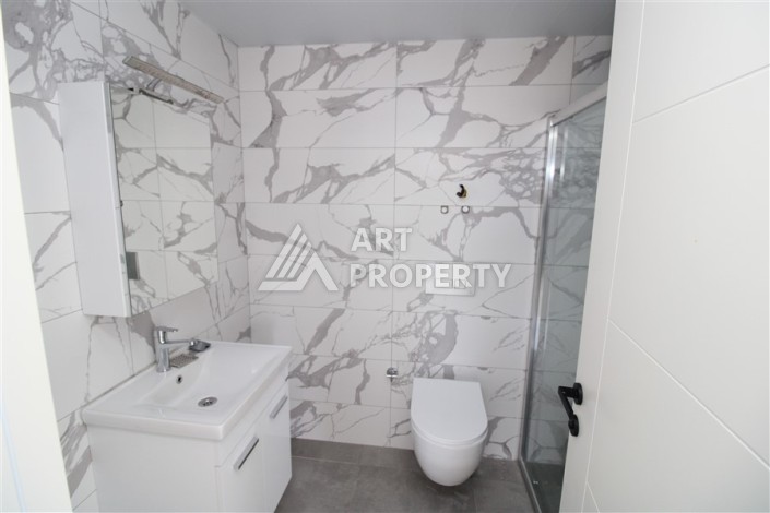 Квартира 2+1 в новом доме, 90 кв.м. Центр Махмутлара - Ракурс 9