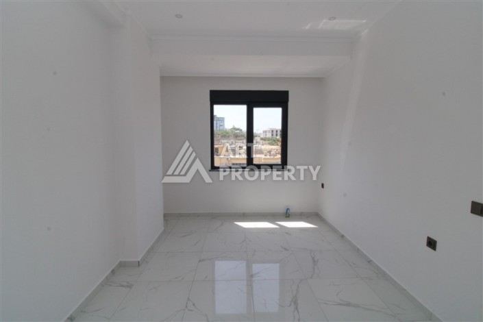 Квартира 2+1 в новом доме, 90 кв.м. Центр Махмутлара - Ракурс 10