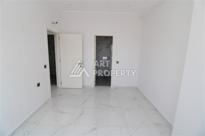 Квартира 2+1 в новом доме, 90 кв.м. Центр Махмутлара - Ракурс 11