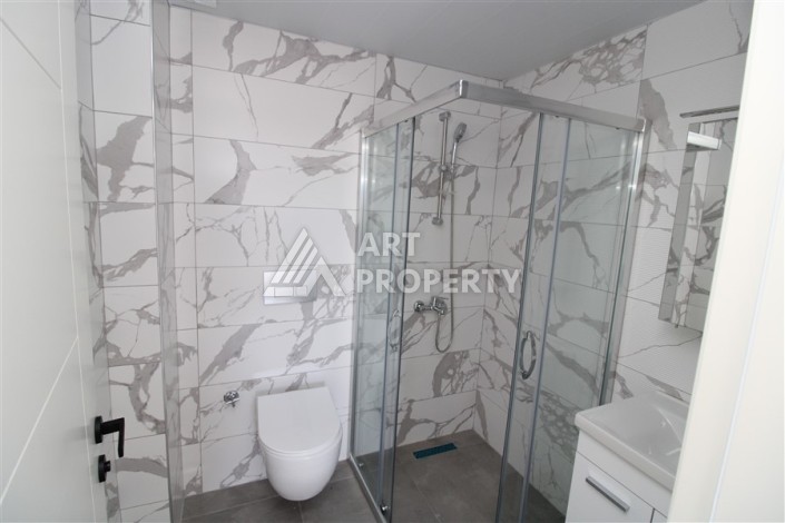 Квартира 2+1 в новом доме, 90 кв.м. Центр Махмутлара - Ракурс 12