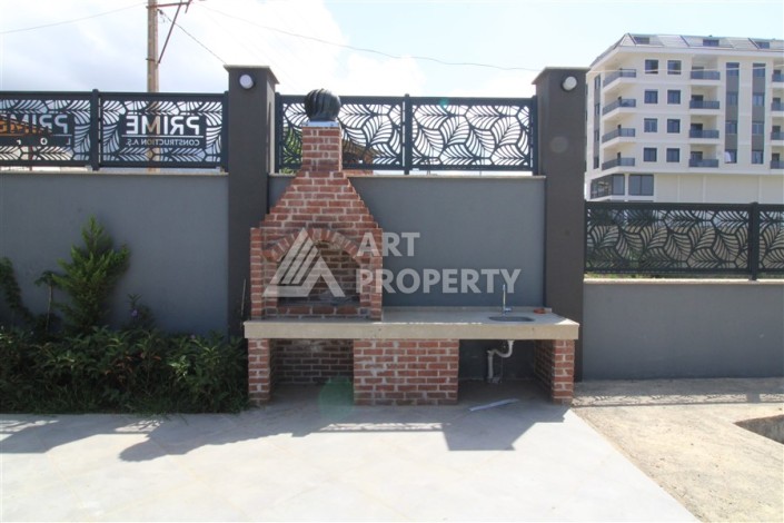 Квартира 2+1 в новом доме, 90 кв.м. Центр Махмутлара - Ракурс 17