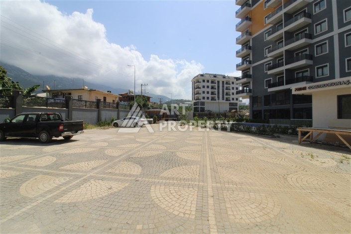 Квартира 2+1 в новом доме, 90 кв.м. Центр Махмутлара - Ракурс 25