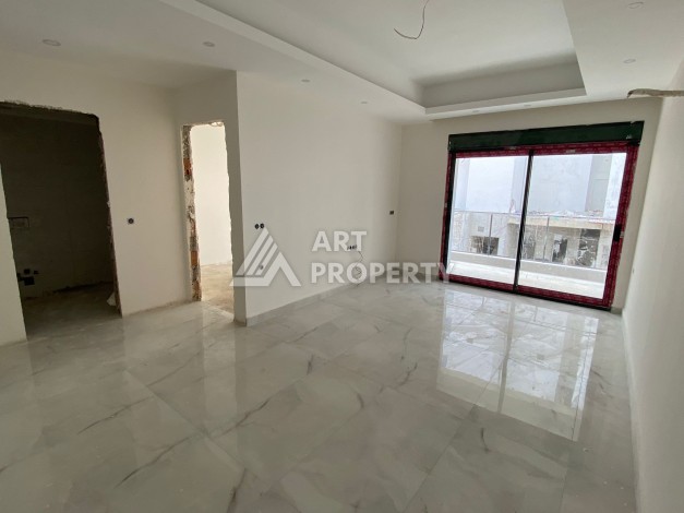 Современная квартира 1+1 с просторной планировкой 60 кв.м. в Махмутларе - Ракурс 9