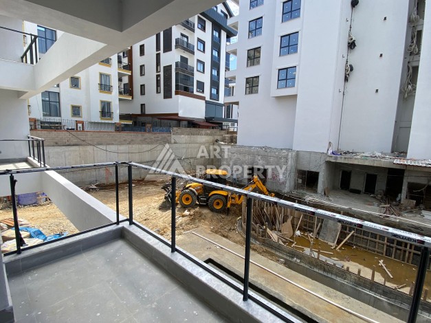 Современная квартира 1+1 с просторной планировкой 60 кв.м. в Махмутларе - Ракурс 15