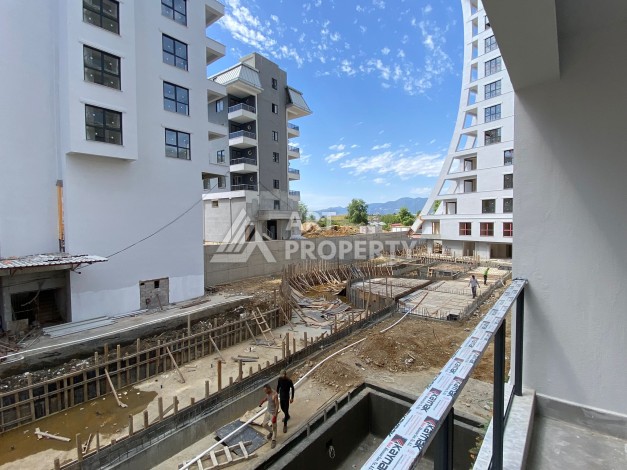 Современная квартира 1+1 с просторной планировкой 60 кв.м. в Махмутларе - Ракурс 16