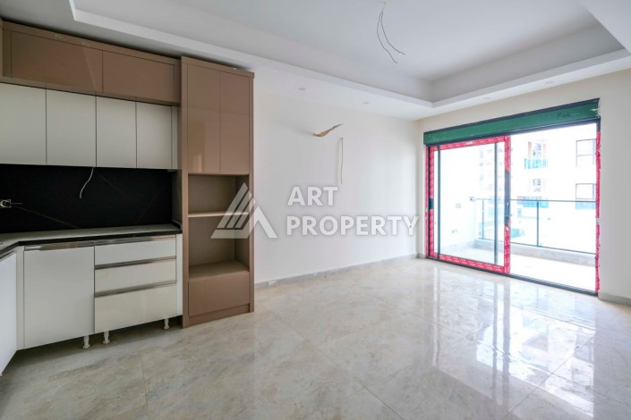 Престижные апартаменты 1+1 в районе Махмутлар, 60 кв.м. - Ракурс 7