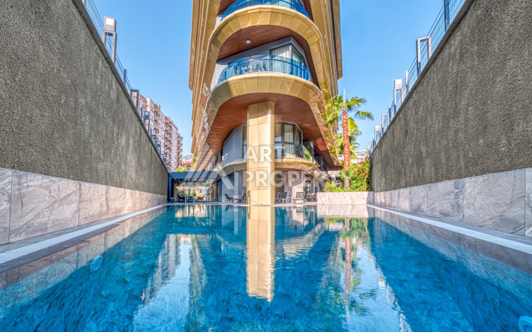 Квартира 1+1 в элитном ЖК, 55 кв.м. Центр, Алания - Ракурс 2