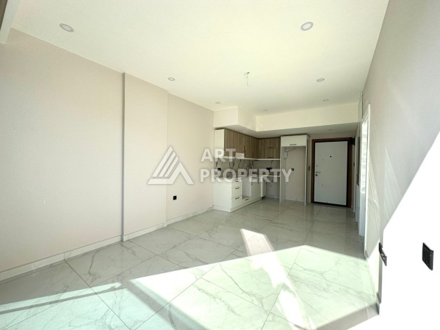 Квартира 1+1 в элитном ЖК, 55 кв.м. Центр, Алания - Ракурс 13