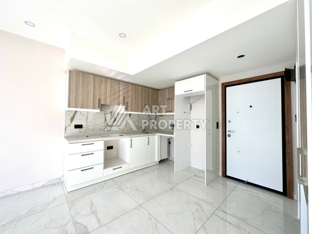 Квартира 1+1 в элитном ЖК, 55 кв.м. Центр, Алания - Ракурс 15