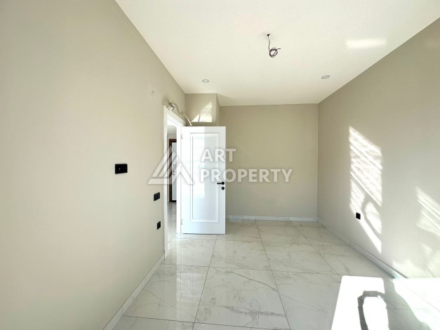 Квартира 1+1 в элитном ЖК, 55 кв.м. Центр, Алания - Ракурс 17