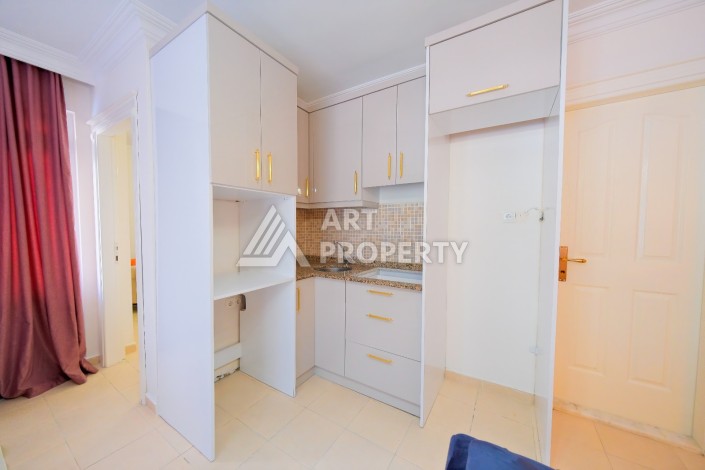 Квартира 1+1 с дизайнерским ремонтом в центре Алании, 300 м от моря - Ракурс 5