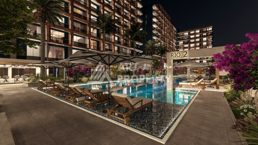 Старт строительства инвестиционного проекта с квартирами 0+1, 1+1, 2+1 в 520 метрах от моря. Томюк, Мерсин. - Ракурс 20