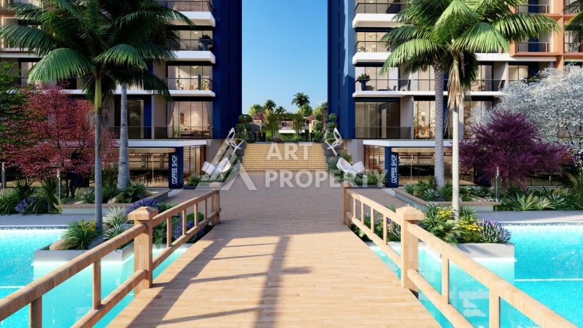 Старт строительства инвестиционного проекта с квартирами 0+1, 1+1, 2+1 в 520 метрах от моря. Томюк, Мерсин. - Ракурс 23