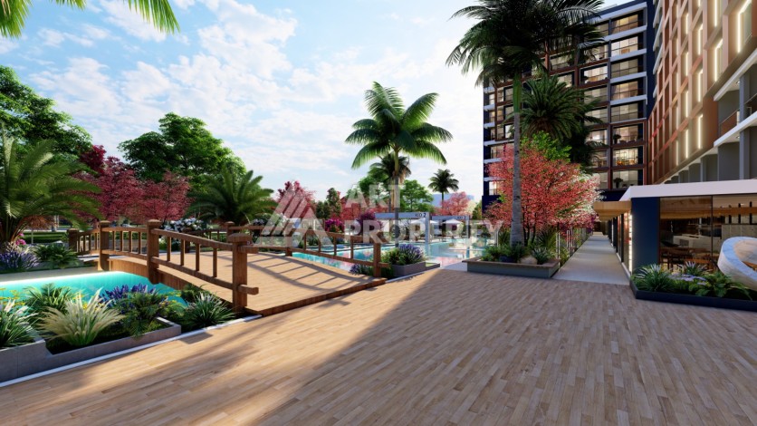 Старт строительства инвестиционного проекта с квартирами 0+1, 1+1, 2+1 в 520 метрах от моря. Томюк, Мерсин. - Ракурс 27