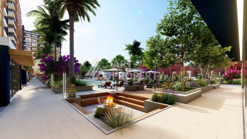 Старт строительства инвестиционного проекта с квартирами 0+1, 1+1, 2+1 в 520 метрах от моря. Томюк, Мерсин. - Ракурс 28