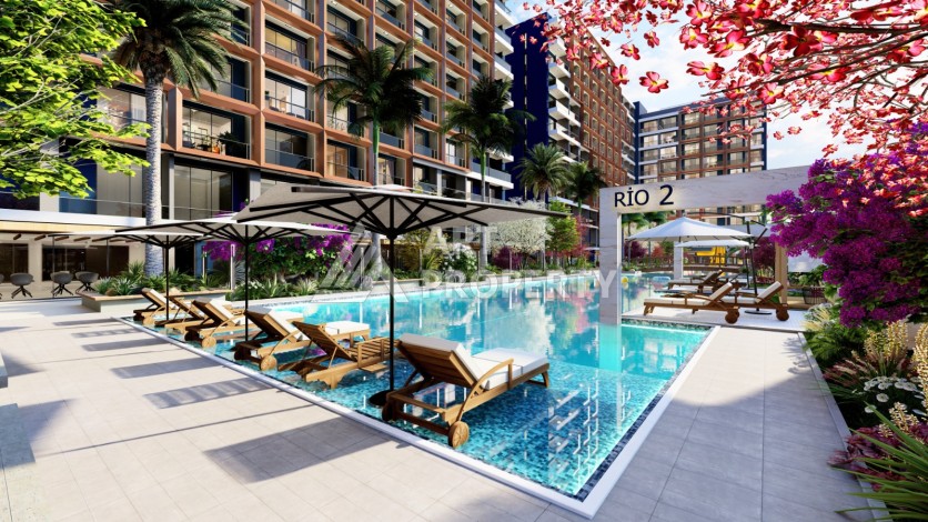 Старт строительства инвестиционного проекта с квартирами 0+1, 1+1, 2+1 в 520 метрах от моря. Томюк, Мерсин. - Ракурс 31