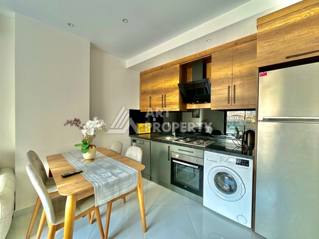 Квартира 1+1 в популярной резиденции, 55 кв.м. Махмутлар, Алания - Ракурс 2