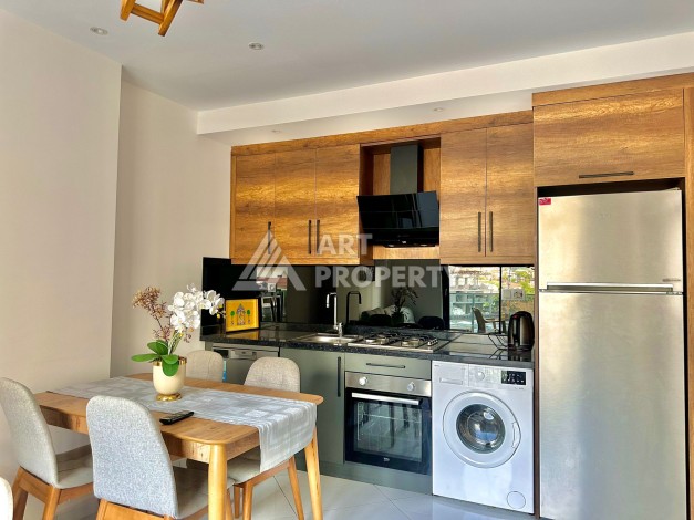 Квартира 1+1 в популярной резиденции, 55 кв.м. Махмутлар, Алания - Ракурс 9