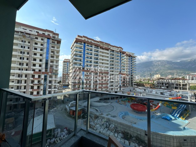 Квартира 1+1 в популярной резиденции, 55 кв.м. Махмутлар, Алания - Ракурс 11