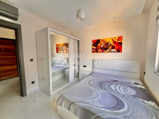 Квартира 1+1 в популярной резиденции, 55 кв.м. Махмутлар, Алания - Ракурс 14