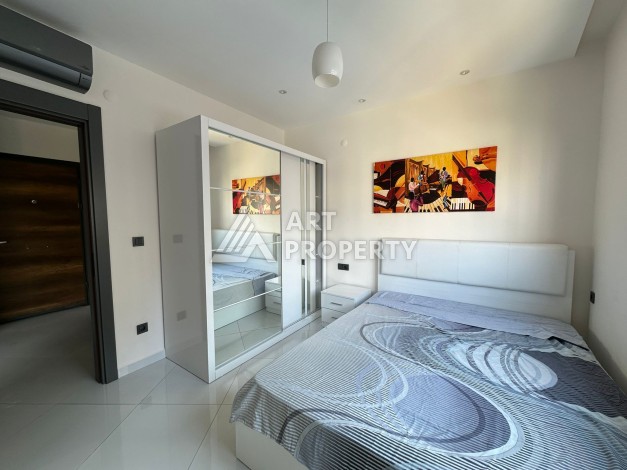 Квартира 1+1 в популярной резиденции, 55 кв.м. Махмутлар, Алания - Ракурс 15