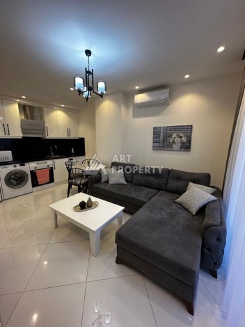 Квартира 1+1 в престижной резиденции Махмутлара, 55 кв.м. - Ракурс 3