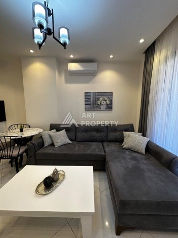 Квартира 1+1 в престижной резиденции Махмутлара, 55 кв.м. - Ракурс 5